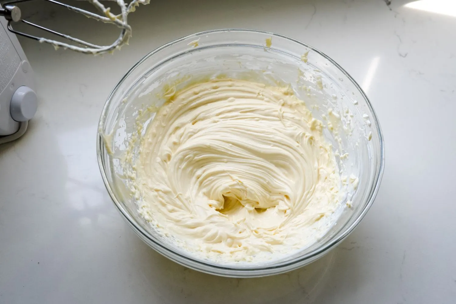 Mini-Key-Lime-Pies-2.jpg Cream cheese, Greek yogurt, and sweetened condensed milk beat with a hand mixer in a large bowl.